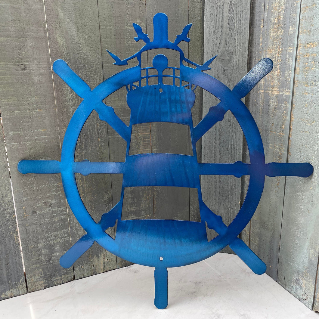 Lighthouse and Ship Wheel Sign
